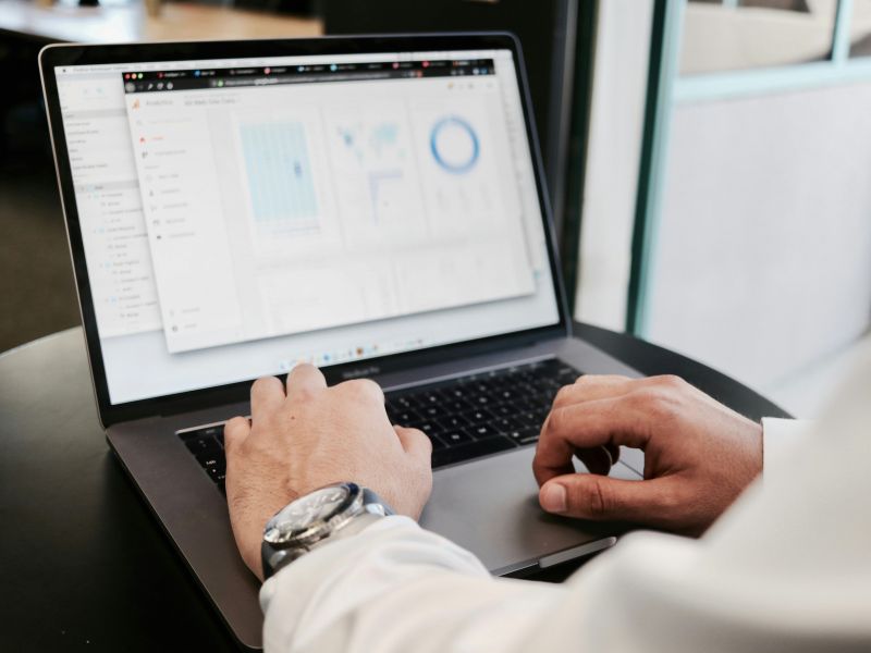 Man typing on laptop